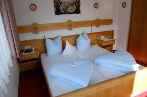 Postel nebo postele na pokoji v ubytování Haus Oberland