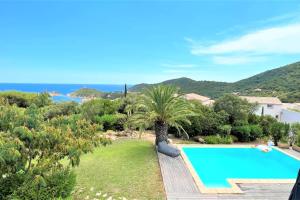 a villa with a swimming pool and a view of the ocean at Villa Surella Di Fautea in Conca