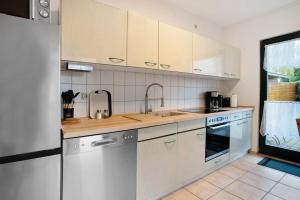 Kuchyň nebo kuchyňský kout v ubytování Ferienhaus Darß-Fischland