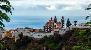 a city on top of a hill with buildings at Lucia Home in Moya