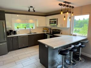 Afbeelding uit fotogalerij van Chalet des Érables in Petite-Rivière-Saint-François