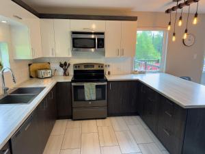 Afbeelding uit fotogalerij van Chalet des Érables in Petite-Rivière-Saint-François