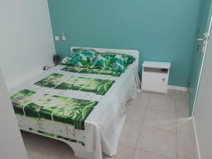 Postel nebo postele na pokoji v ubytování Charmant appartement entre mer et forêt