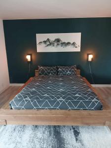 Postel nebo postele na pokoji v ubytování La terrasse sur le Lac