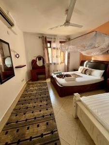 Katil atau katil-katil dalam bilik di Coastal bliss apartment +31 gambar