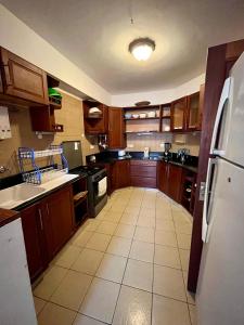 Dapur atau dapur kecil di Coastal bliss apartment