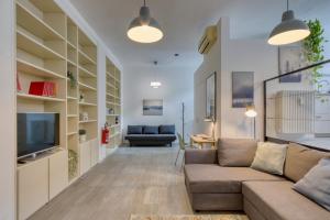 Χώρος καθιστικού στο I-Host Apartment - Maffei 20