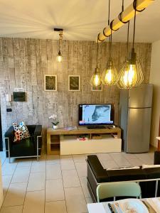 TV a/nebo společenská místnost v ubytování Bnbook Blue River -2 bedrooms and private parking