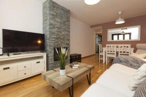 TV a/nebo společenská místnost v ubytování Casa MiMar by BeValle