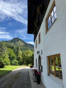 a building with a view of a mountain at Landhaus Bergfreude in Berwang
