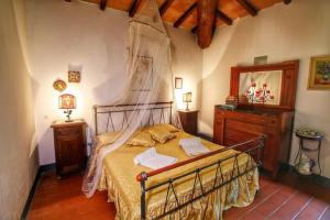 Postel nebo postele na pokoji v ubytování Casa Vacanza Le Corniole + 27 fotografií