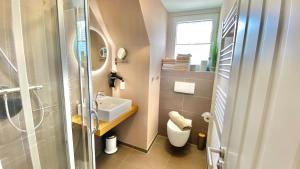 Et badeværelse på Wilkens Hus 'Wilkens Hus' RIEKE + 7 billeder