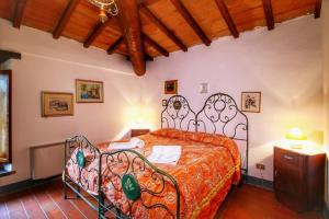 A bed or beds in a room at Casa Vacanza Le Corniole