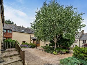 a house with a tree in a yard at 2 bed in Ilfracombe MALTC in West Down