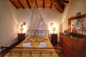 A bed or beds in a room at Casa Vacanza Le Corniole