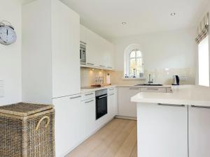 Kuchyň nebo kuchyňský kout v ubytování Salig Hüs von Appartements & Mehr