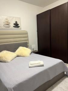 Katil atau katil-katil dalam bilik di Artley Home Ladispoli