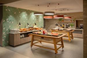 O bucătărie sau chicinetă la Intercity Porto Alegre Aeroporto