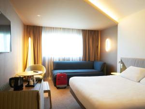 Ruang duduk di Novotel Marne La Vallée Collégien +64 gambar