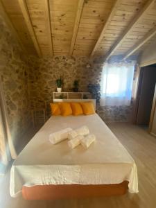 Кровать или кровати в номере Casa de Piedra & Relax