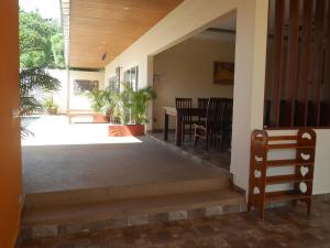 a view of the front porch of a house at Villa family in Ban Saiyuan (1)