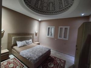 Postel nebo postele na pokoji v ubytování Villa sultan Djerba + 35 fotografií