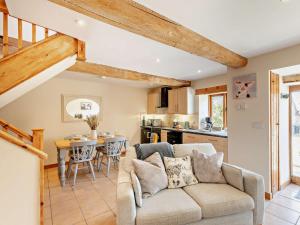 a living room with a couch and a table at 2 Bed in Ludlow 96046 in Tugford