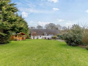 an image of a house with a yard at 3 Bed in Newquay 82369 in Mitchell