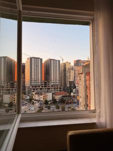 a view of a city from a window at Apartment in Prishtina, Kosovo in Pristina