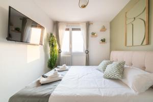 Ένα ή περισσότερα κρεβάτια σε δωμάτιο στο Luxurious 3 Bedrooms Sauna Jacuzzi