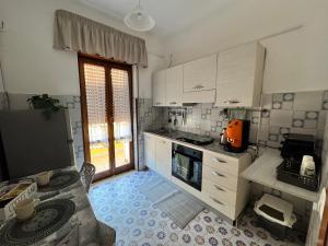 Η κουζίνα ή μικρή κουζίνα στο Casa LuAn