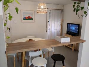 TV a/nebo společenská místnost v ubytování Great Lofty + 6 fotografií