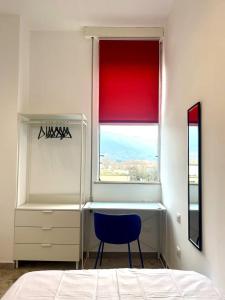 Ένα ή περισσότερα κρεβάτια σε δωμάτιο στο Appartamento vicino a Firenze +13 φωτογραφίες