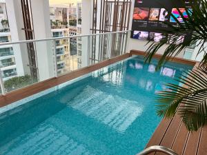 a swimming pool on top of a building at Queen of the Red Sea Eilat Crown Group Collection in Eilat
