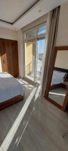 Postel nebo postele na pokoji v ubytování Minaland Beach Resort & Aquapark