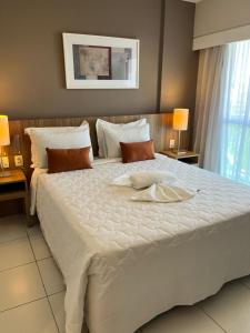 Кровать или кровати в номере Rio Centro Stay 1