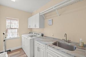 a kitchen with a sink and a dishwasher at Datura Dreams in Southgate +42 photos