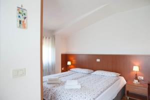 Кровать или кровати в номере Rooms Leban