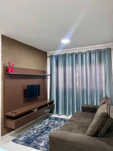 Μια τηλεόραση ή/και κέντρο ψυχαγωγίας στο Home Select Apartamento