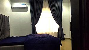 Postel nebo postele na pokoji v ubytování JnR place + 1 fotografie