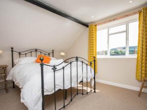 Voodi või voodid majutusasutuse 2 Bed in Seatown DC110 toas