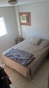 Giường trong phòng chung tại 3n residence