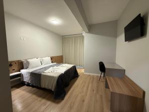 Postel nebo postele na pokoji v ubytování Hotel Bon Vivant