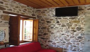 TV a/nebo společenská místnost v ubytování Mystras Inn