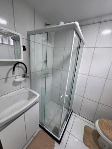 O baie la Loft em condomínio próximo à entrada da cidade