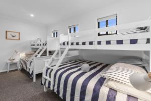 Postel nebo postele na pokoji v ubytování The Whale Pod - Serene Family Retreat