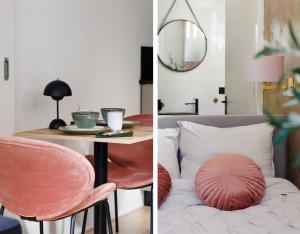 a room with a bed and a table with a chair at Guesthouse de Leeuwerik in Haastrecht