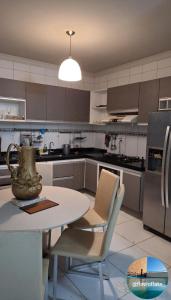 Η κουζίνα ή μικρή κουζίνα στο Flat House Veraneio