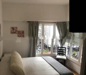 Ένα ή περισσότερα κρεβάτια σε δωμάτιο στο Tu refugio en MDP, cómodo y céntrico