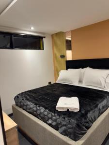 Ένα ή περισσότερα κρεβάτια σε δωμάτιο στο Hotel Biba Life - Chia +22 φωτογραφίες